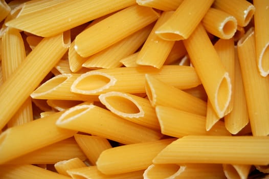 Penne pasta background pattern.
