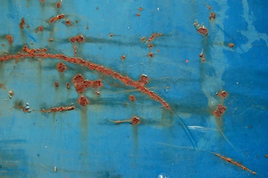 Metal texture with blue paint and rust. Abstract background.