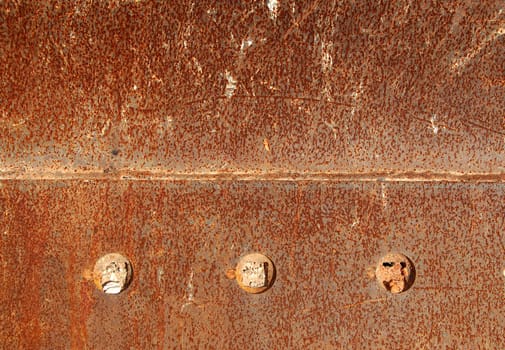 Rusty metal bolts. Industrial background texture.