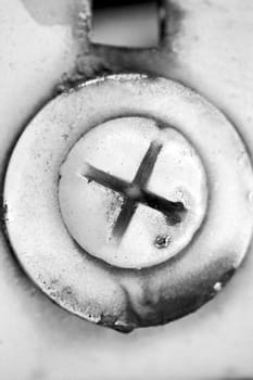 Rusty metal screw texture macro. Black and white.