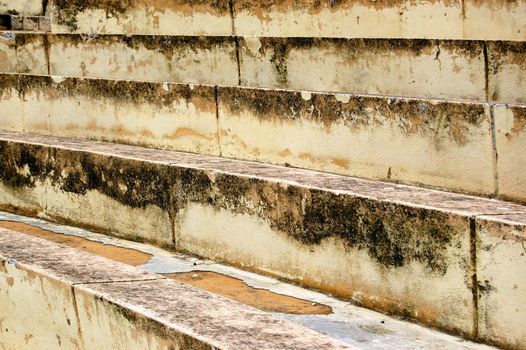 Weathered amphitheater stone steps.