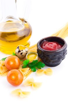 Pasta ingredients with olive oil, ketchup, cherry tomato and eggs