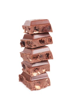 Stack of chocolate chunks isolated against a white background