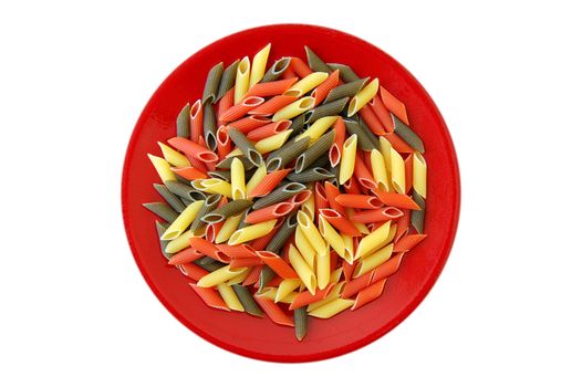 Red plate with tricolor penne pasta isolated on white background.
