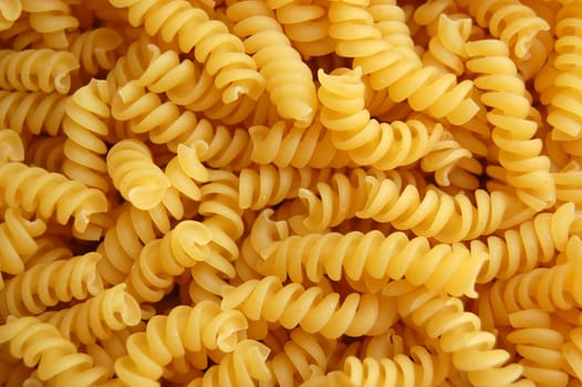 Eliche twirls pasta detail. Italian food background.