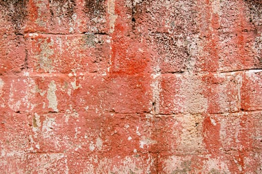 Cinder block brick wall texture. Grungy peeling paint background pattern.