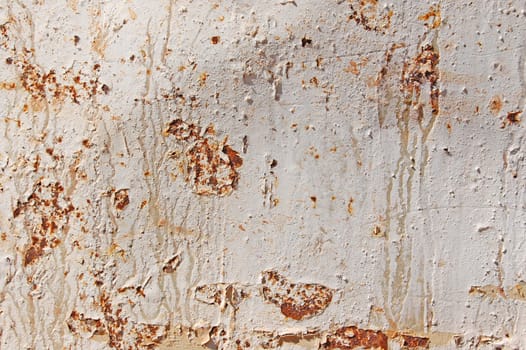 Rusty metal texture background. Peeling white paint.