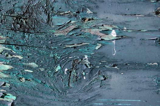 Old wood plank surface detail. Peeling paint texture. Abstract background.