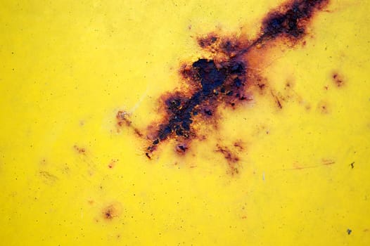Rusty yellow metal texture. Abstract industrial background.