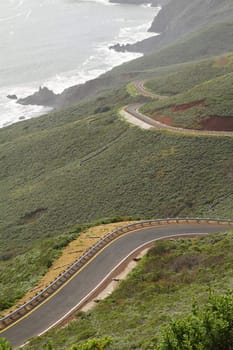 A road on hills by the ocean