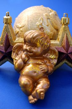 Christmas tree angel, stars and bauble decoration.