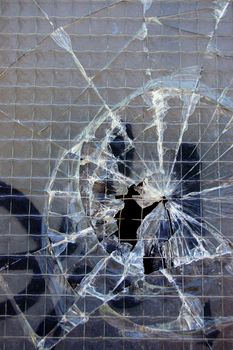 Broken glass surface texture detail. Abstract background pattern.