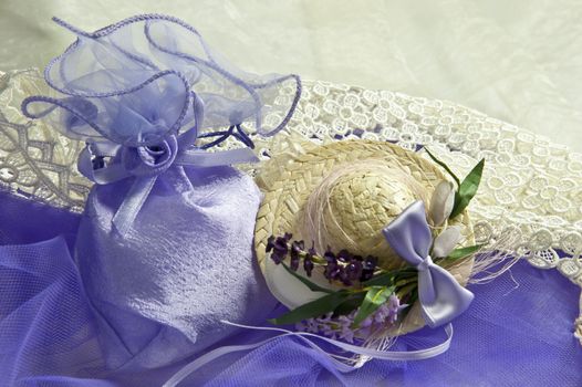 two weeding Favors  for weddings  on purple fabric