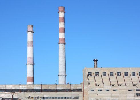 chimneys large plant against the blue sky