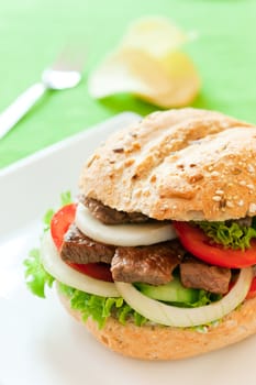 Fresh and healthy sandwich with vegetables and beef sliced