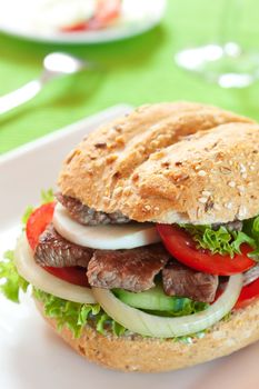 Fresh and healthy sandwich with vegetables and beef sliced