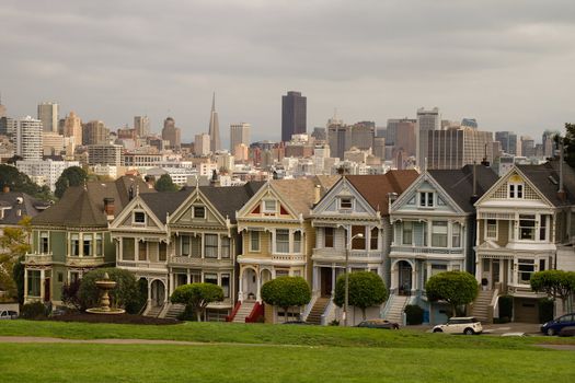 Painted Ladies Row Houses by Alamo Square with San Francisco Skyline