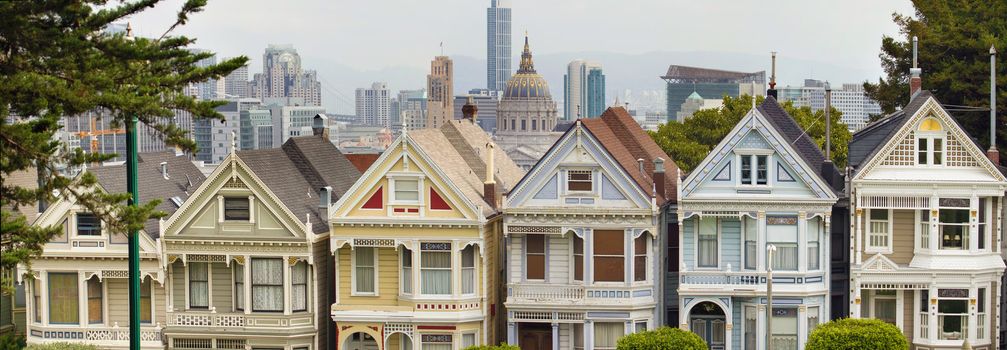 Painted Ladies Row Houses by Alamo Square with San Francisco Skyline Panorama