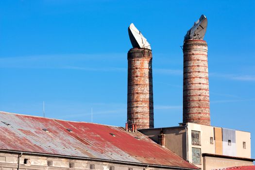 View of a factory and its two chimneys