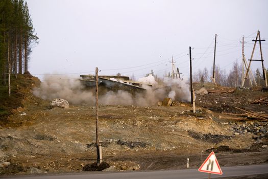 Blasting operations in the construction of roads. Time of the explosion
