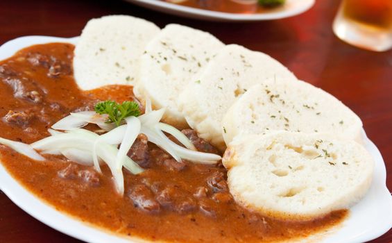 Beef goulash and dumplings (knedliky) from Czech Republic