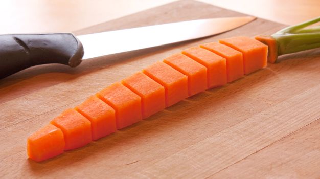 Carrot cut and re-form, knife and plank