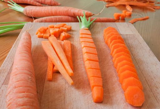 Several cutting of carrot, slices, pieces, sections