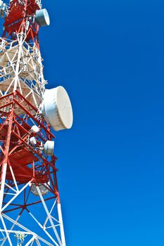 Communications tower with a beautiful blue sky