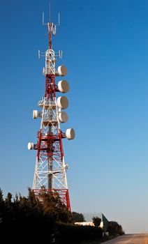 Communications tower with a beautiful blue sky