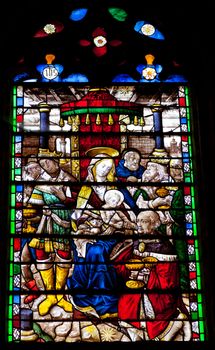 Wonderful ancient stained glass window formed of multiple colors