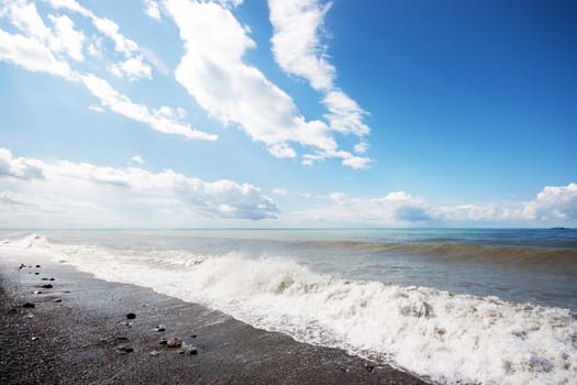 Empty beach and ocean in summertime