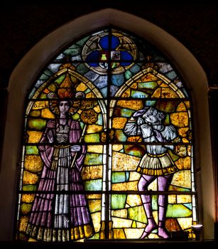 Wonderful ancient stained glass window formed of multiple colors