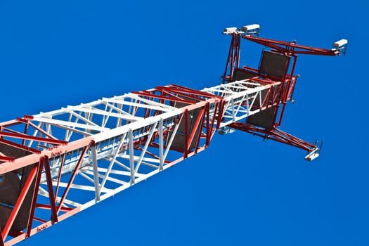 Communications tower with a beautiful blue sky