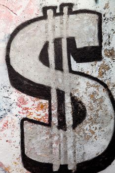 Graffiti of a sign of the dollar