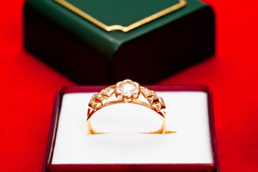 Fantastic gold ring adorned with several white zirconia