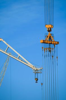 Cranes of the dockyards of Cadiz in a sunny day