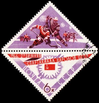 USSR - CIRCA 1966: A post stamp printed in USSR shows ice hockey, devoted to the Winter Games of people of the USSR, series, circa 1966