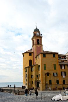 glimpse of the ancient church of a picturesque village in Italy in winter