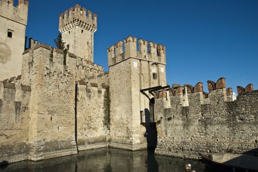 an ancient fortress on an Italian lake