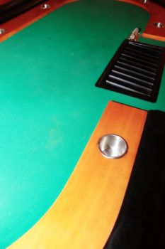 conceptual empty green casino table with copy space