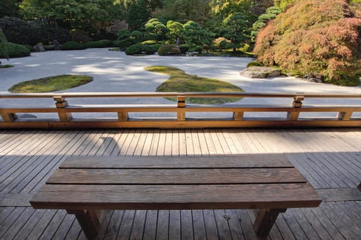 View of Japanese Sand Garden from Wooden Bench under Pavilion