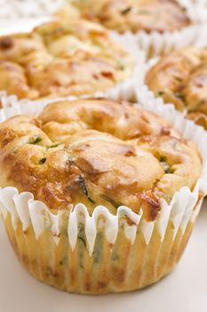 Freshly baked spinach and cheese muffins ready to be served