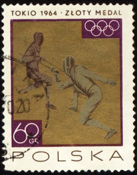 POLAND - CIRCA 1964: A post stamp printed in Poland shows two fighting fencers, devoted to Olympic games in Tokio, series, circa 1964