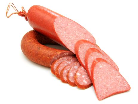 Tasty sausage is curtailed by a ring lies on a white background