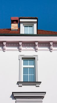 Facade of little construction with windows