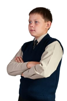 Schoolboy. Isolated over white background. The boy is dressed in a vest.