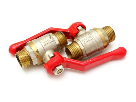 The water crane from white metal with the red handle on a white background