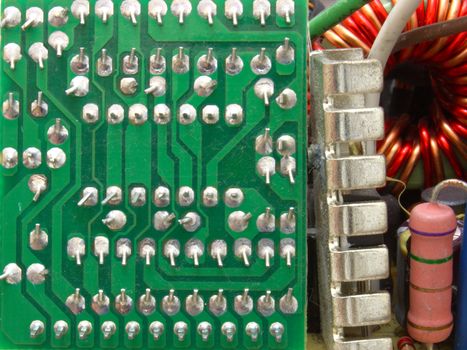 The computer power unit in an open kind with details and electric wires