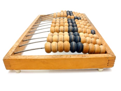 Accounting abacus for financial calculations lies on a white background