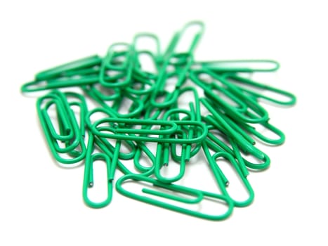 Color paper clips to background. Isolated on white background